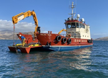 Crane working over vessels bow